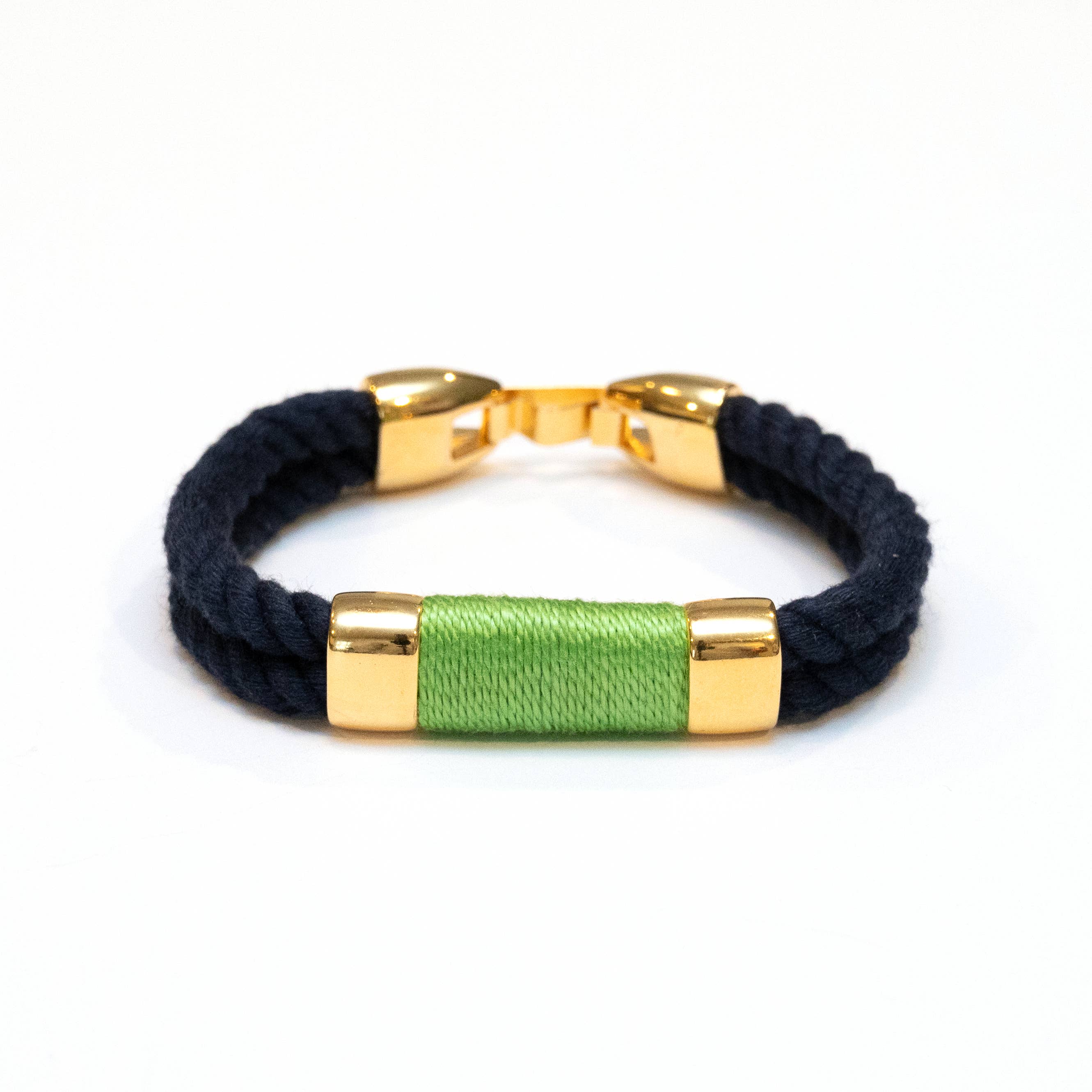 Navy blue braided bracelet with gold and green accents on a white background